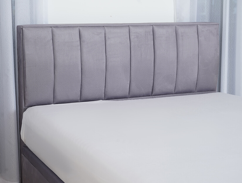 Thick & padded headboard. Vertical channel tufting. Elegant & cozy.