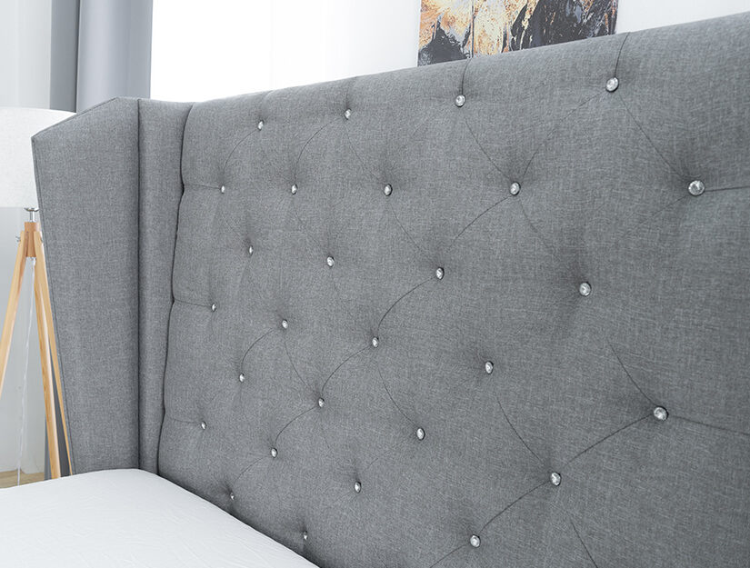 Tall headboard. Classic crystal tufting. Thick, padded headboard with wingback design. Sophisticated & glamourous.