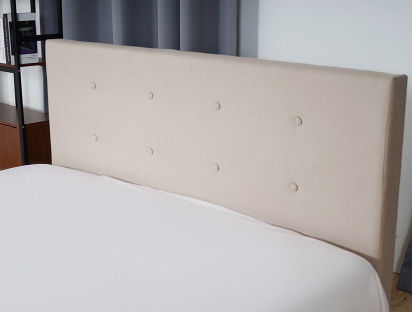 Thick padded headboard. Timeless button tufting. Versatile elegance.