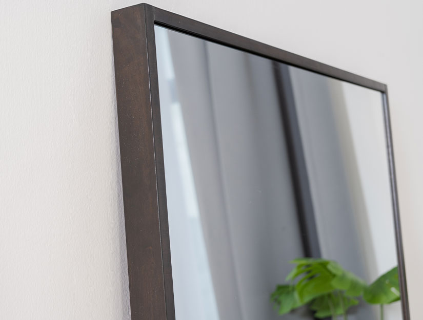 Wide polished mirror. Beautiful wooden frame. Strong & elegant.