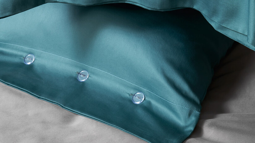 Button-up pillowcases.  Ensures pillow covers stay in place.   