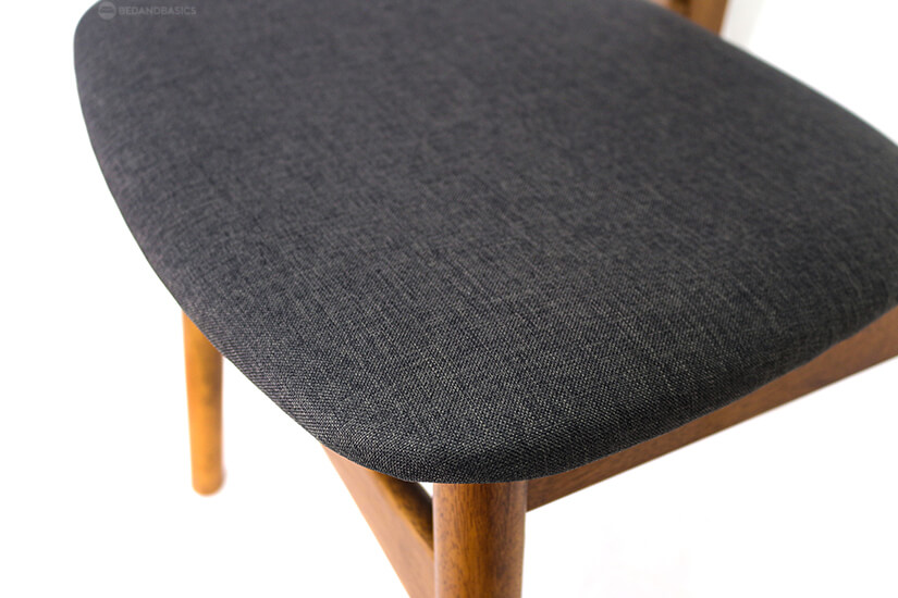 Dark grey fabric covers the comfortable seat cushion.
