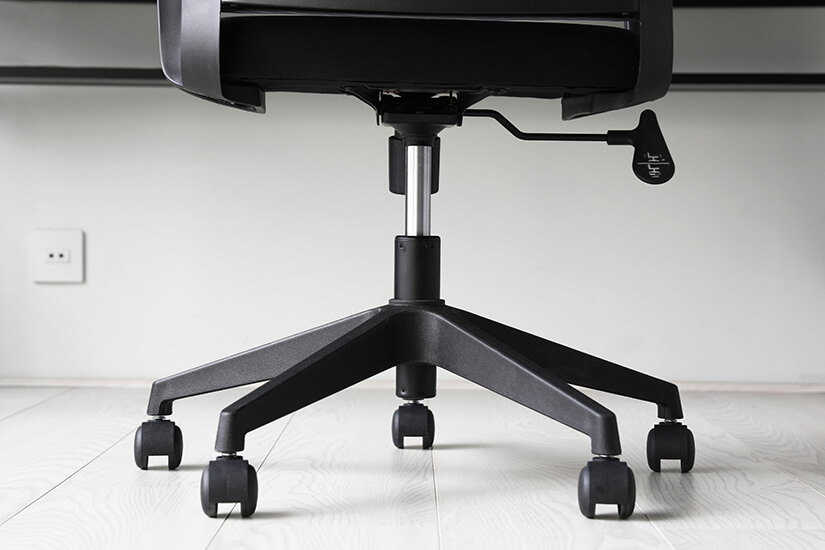 Black nylon base. Easy to move and assemble. 5 legs for support and stability.  