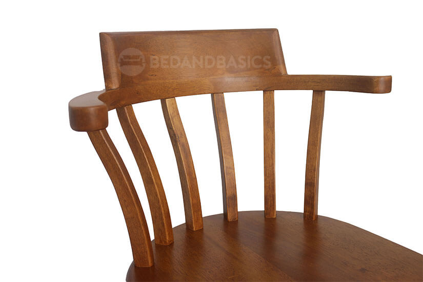 The chair has deep brown tones and a smooth finish. 