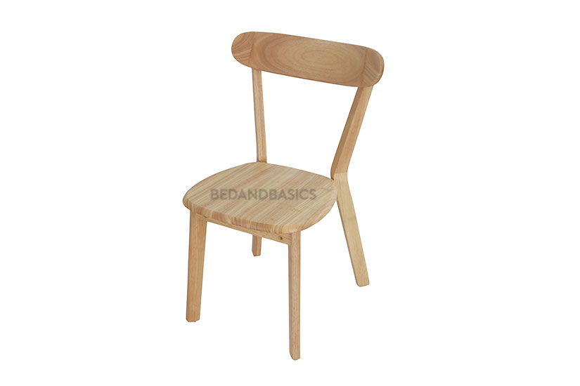 Its geometric silhouette accentuates the chair’s simple design.