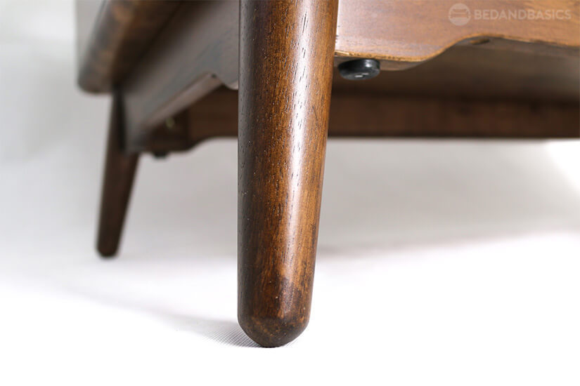 Supported with rounded tapered solid wood legs to provide sturdy support.