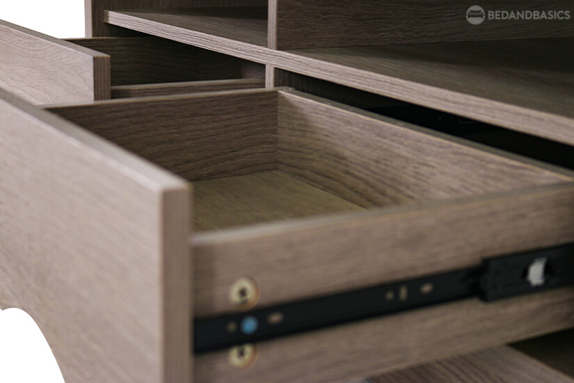 The light ebony veneer coats the entire piece evenly with its attractive and consistent wood grain.