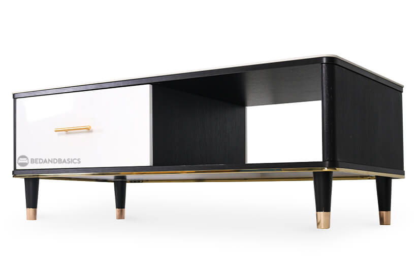 Coated evenly with a dark walnut veneer that gives off a black outlook, the piece is made from sturdy MDF wood that is accented with yellow gold furnishings.