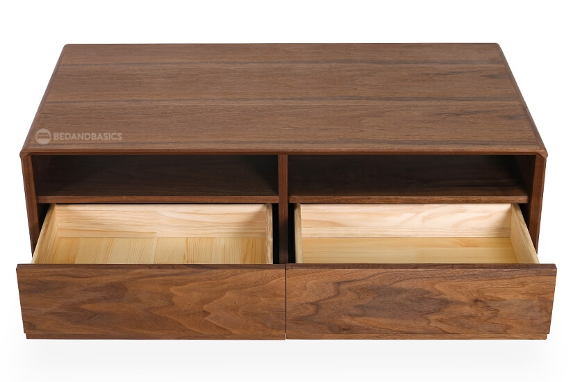 The honey maple colored wood that forms the interior drawers complements the darker exterior and gives off a warm glow.