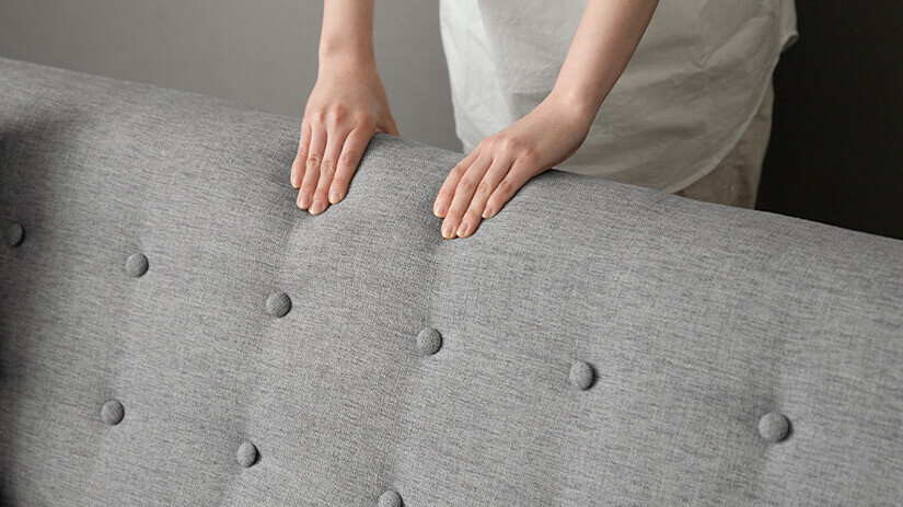Backrest accented with button tufting. Adds dimensionality to design. Breaking its monotony. 