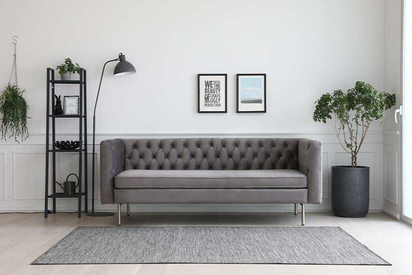 Tuxedo style sofa with straight, sleek armrests. Embodiment of a well-fitted, tuxedo suit. A modern twist to the iconic Chesterfield design.