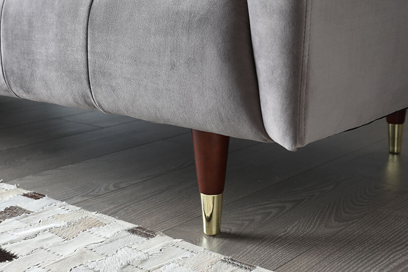 Solid wood legs. Tapered and rounded shape. Golden caps add a luxurious finish.