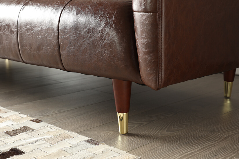 Solid wood legs. Golden caps add a luxurious finish.