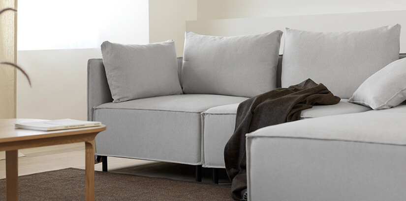 Thin armrests that give a sculpted appearance. Frames the sofa while creating an air of openess.