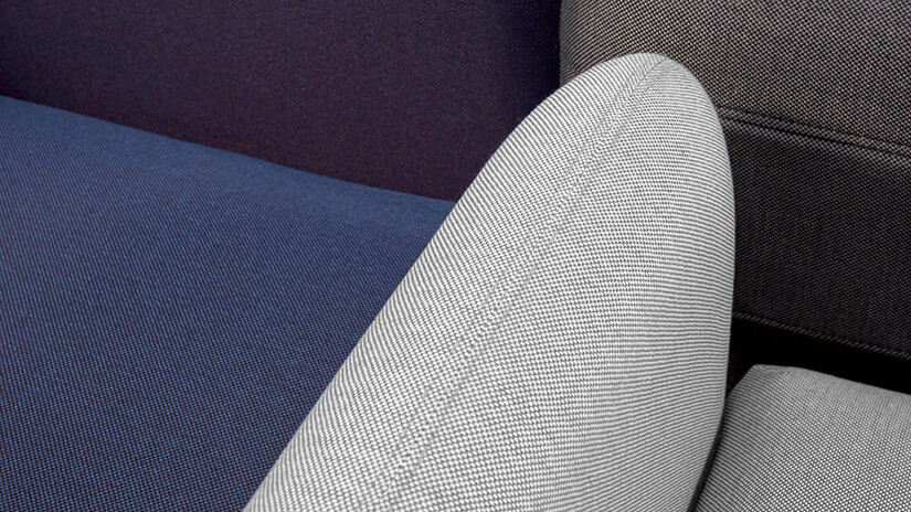 Polyester fabric upholstery. Woven by mixed thread. A multi-layered texture resembling the texture of pebbles.