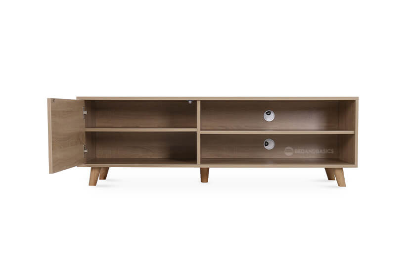 Two open shelves. Wide compartment opens to two more shelves. Two cable grommets. Easy & ample storage.