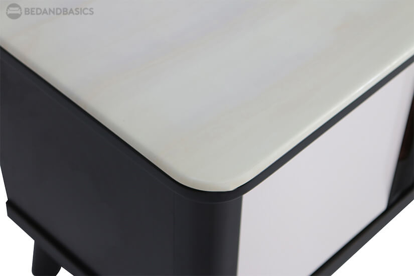 Features a tempered glass with marble design. 