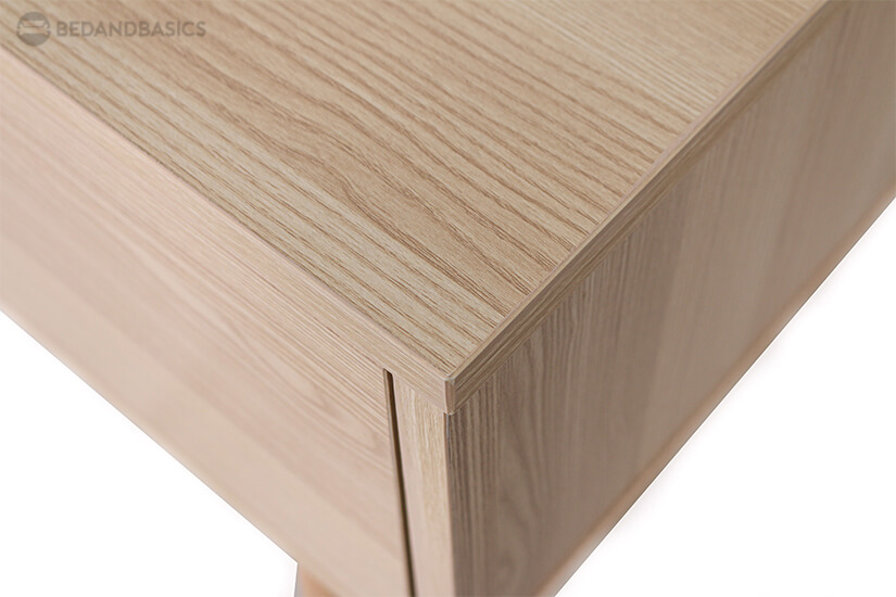 Laminated with natural wood laminates, the details lie in its all-around wood swirl design.  