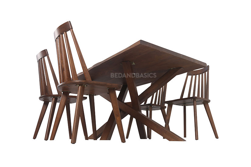 A simple design focused on the geometric lines of the chairs and table.