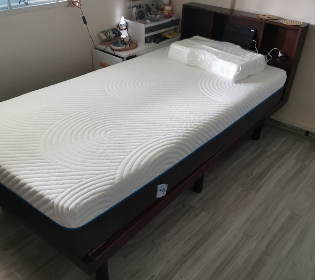 I purchased the Cuenca Bed Frame with Headboard (Japan Size). The item is light but yet sturdy. It is solid wood not compressed wood board. another good feature is the built-in power and USB socket