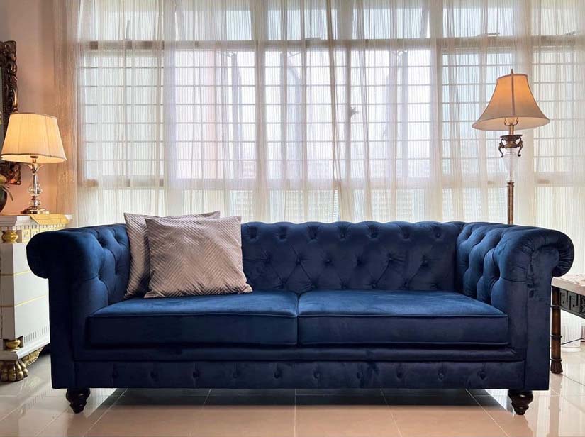 This Blue Velvet (Stain Resistant) Hugo Chesterfield 3 Seater Sofa is upholstered in silky smooth, water-repellent velvet.