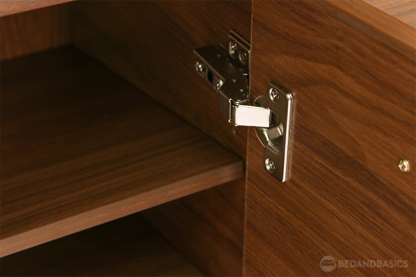 Cabinet doors equipped with soft-close hinges.