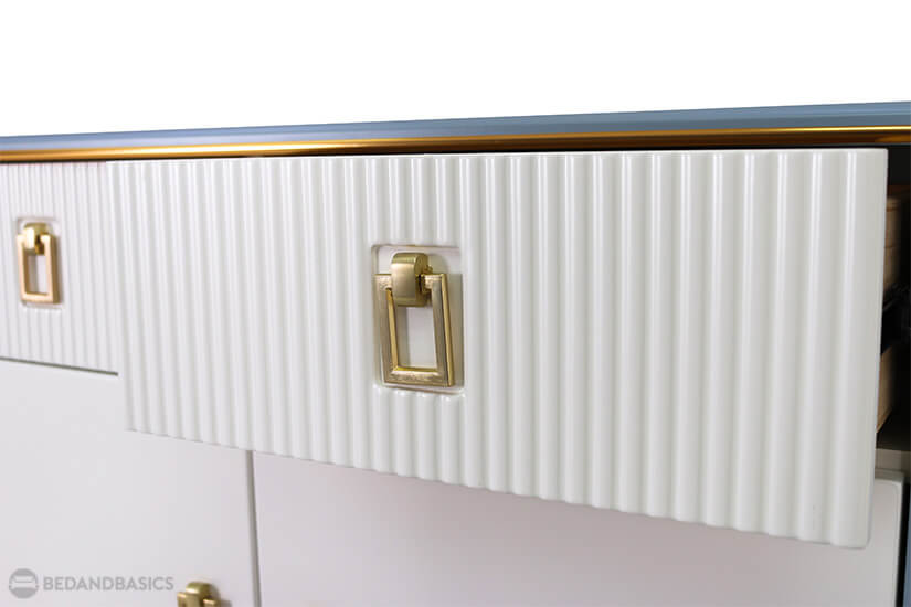Contemporary ridged details on the drawers.  