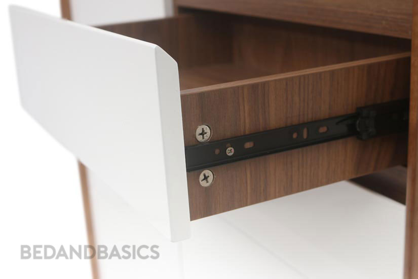 The drawer provides additional space. From socks to shoelaces, create an intuitive storage system with this cabinet. 