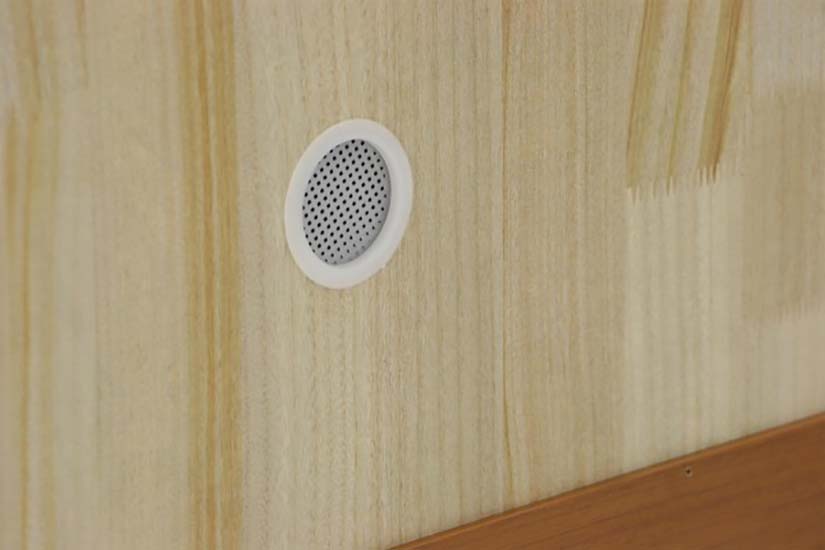 A non-intrusive hole crafted at the top of the cabinet to allow ventilation.