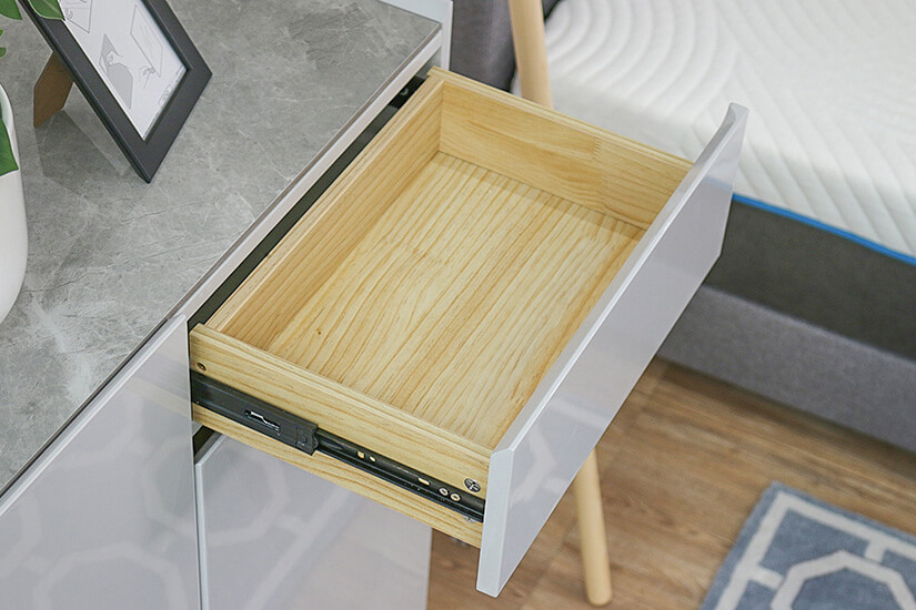 A drawer that glides easily. Extra storage space lined with beautiful natural wood grain.  