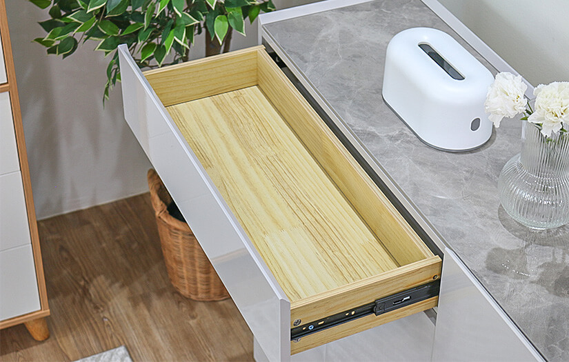 Drawers and shelves lined with natural wood grain. 