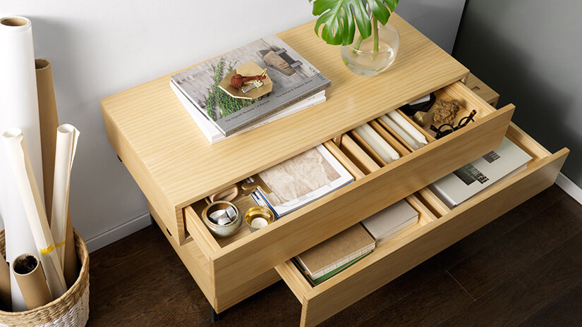 Three layers of storage space. Functional design that keeps your space organised. A minimalist design with no unnecessary frills. Seamless and polished. No handles. Concealed storage compartments.
