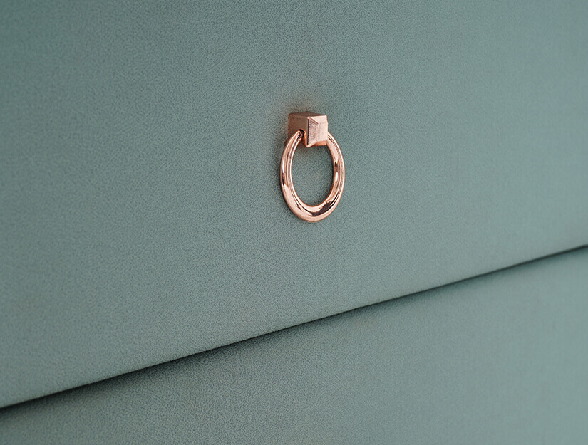 Premium pull handles. Rose gold finish. Touch of opulence.