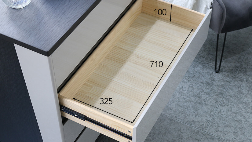 The pullout drawer dimensions of the Colten Chest of Drawers
