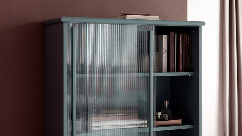 Glass doors reflect light. Highlighting spaces beautifully. Distract eyes from clutter. Doubles up as a display case.