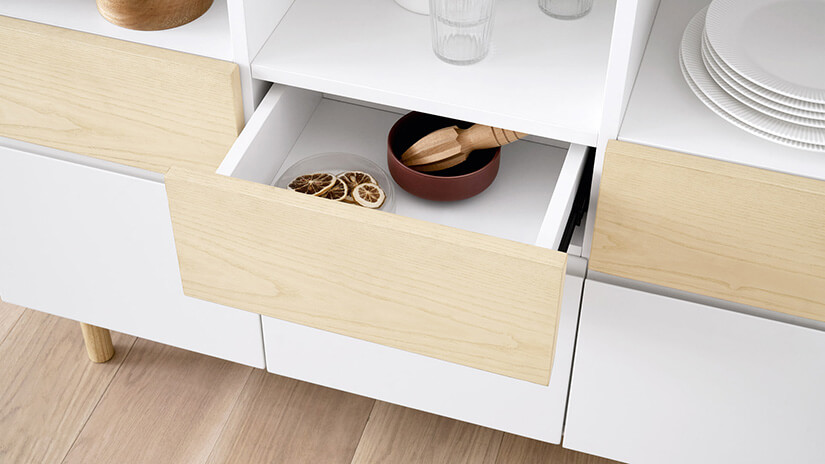 3 compartment types – display shelves, drawers, and concealed shelves. Large storage capacity tailored to different storage needs. Spaces appear tidy and clutter-free.