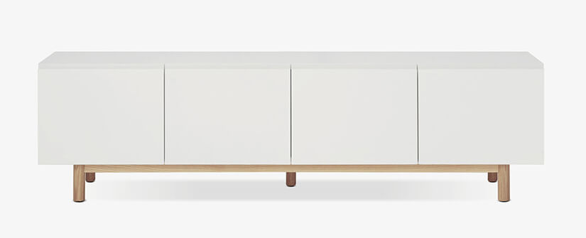 Cloud white panels create a blank canvas to cabinet design. Highlighting details that amplify beauty of the shelf. No handles. Seamless design. Gaps between each storage unit measured with precision. Creating lines that break the monotony of its design.