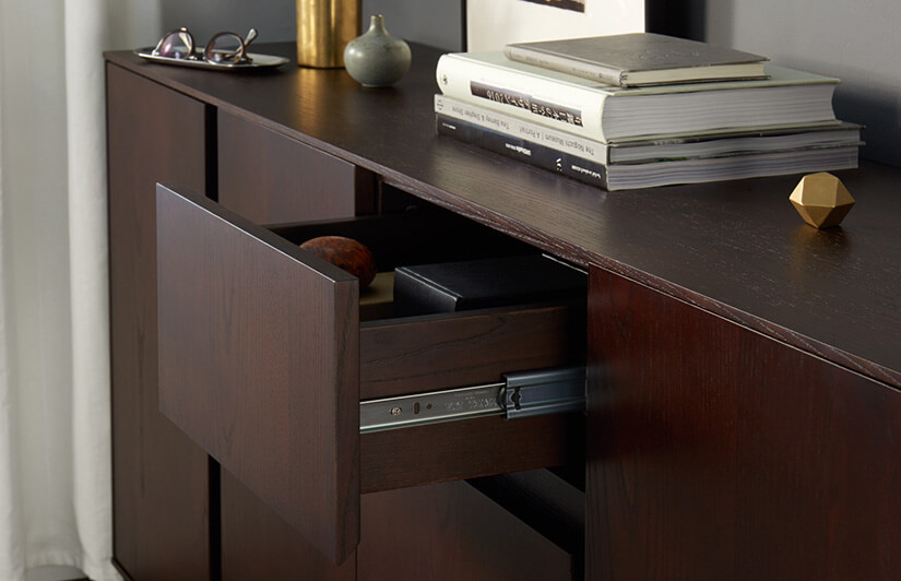 Concealed storage compartments. Drawers that expand cabinet’s storage capacity. Elegant yet functional. Keeps clutter well-hidden.