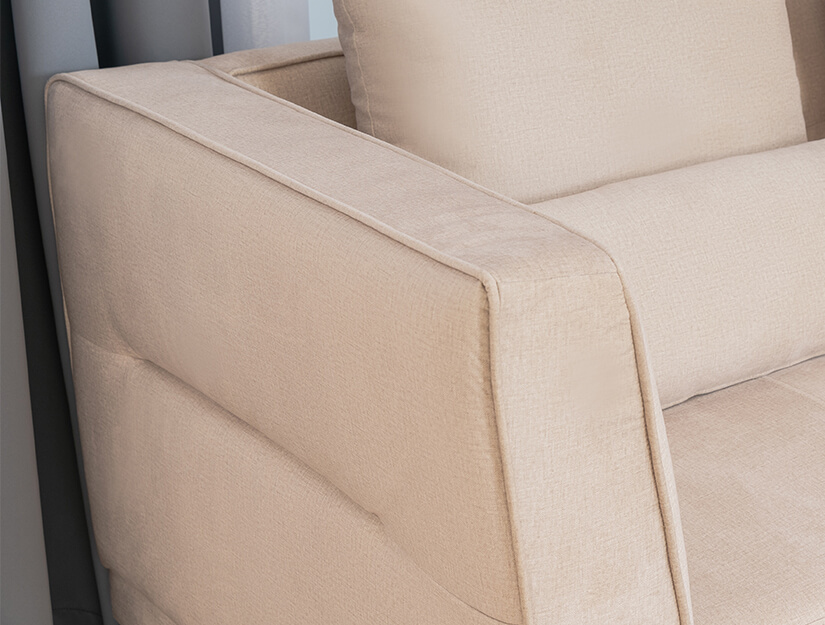 Intricate and elegant piping details outline the armchair. Padded armrests for 
extra comfort when you sit.