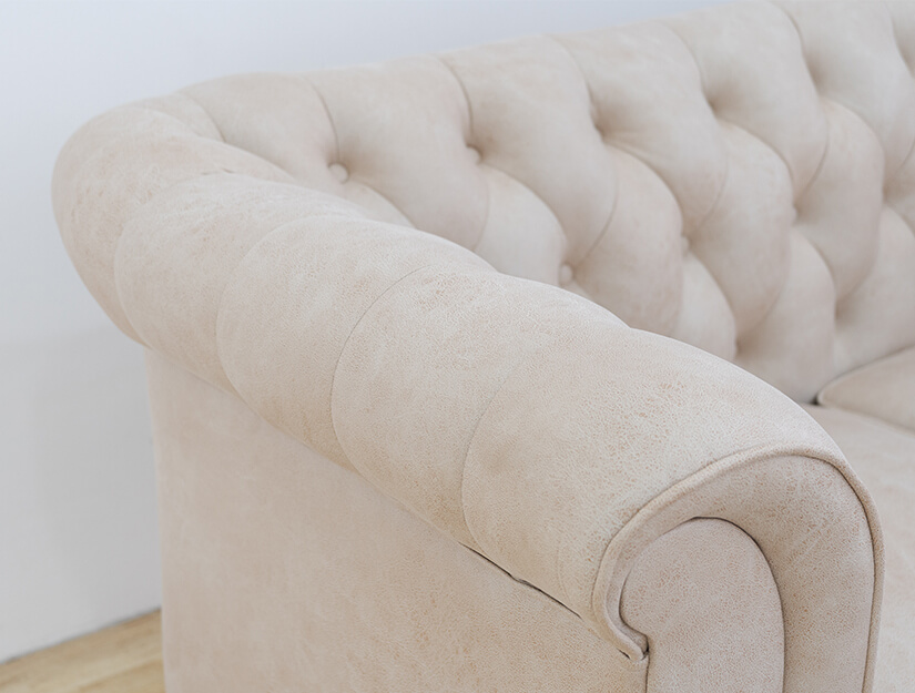 Classic rolled armrests. Hallmark feature of the Chesterfield.