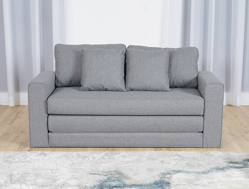 Compact sofa bed design. Turns your living room into a snug retreat.