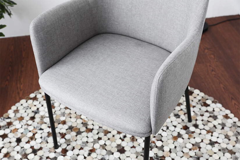 Lined with comfortable fabric upholstery. Its neutral grey shade will match beautifully with various décor schemes.
