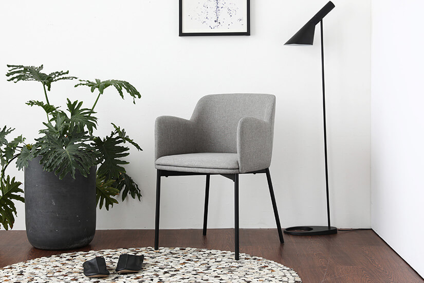 The angular corners that curve down to its armrest gives the armchair a classy look and feel. This versatile piece can fit seamlessly into any work, conference, dining, and lounge settings. 