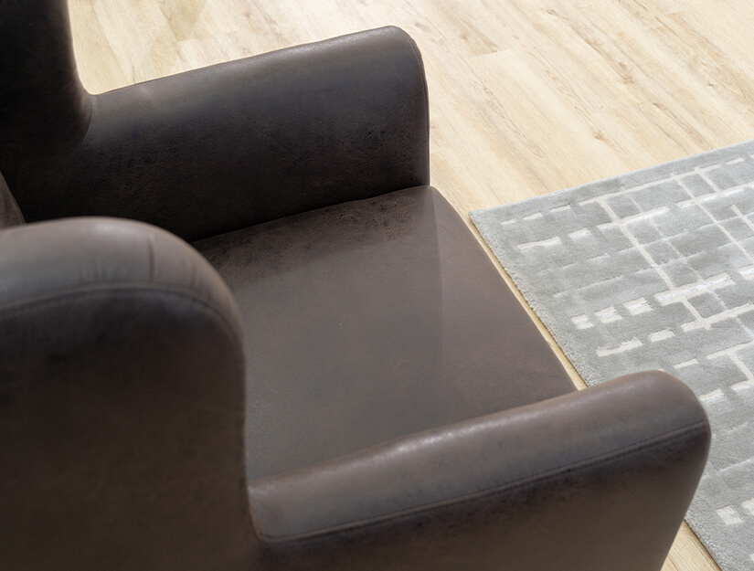 Upholstered in leather-like water & stain resistant high tech fabric. A breeze to clean & maintain.