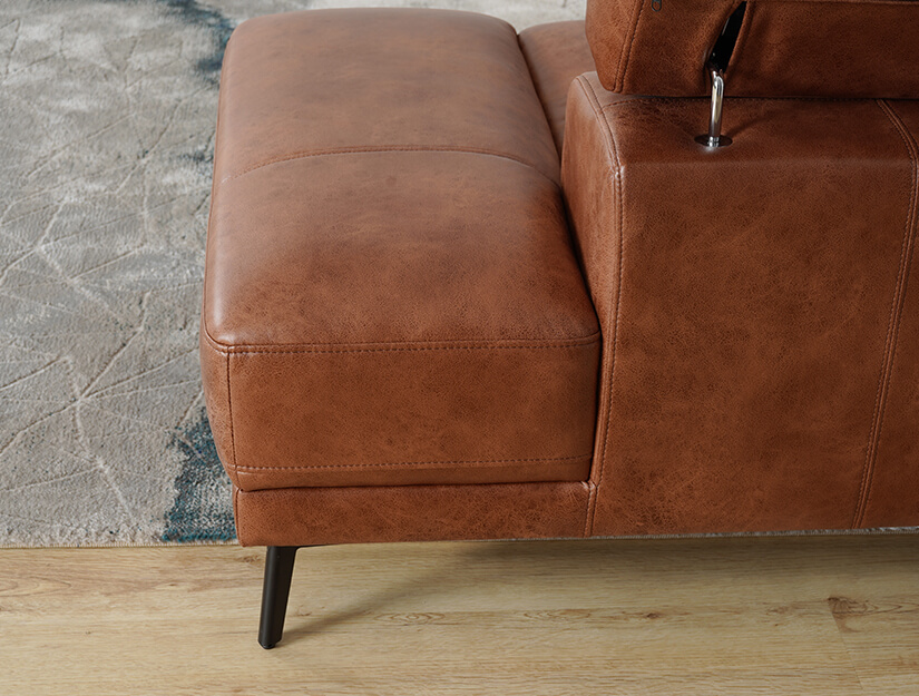 Attached ottoman. Perfect for lounging.
