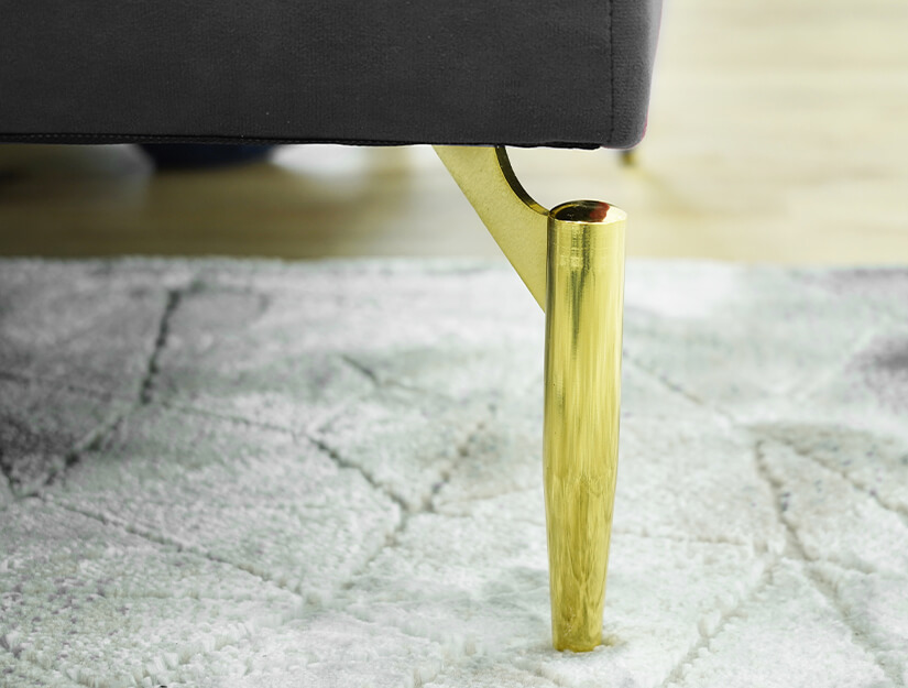 Slim tapered metal legs with a luxurious gold finish.