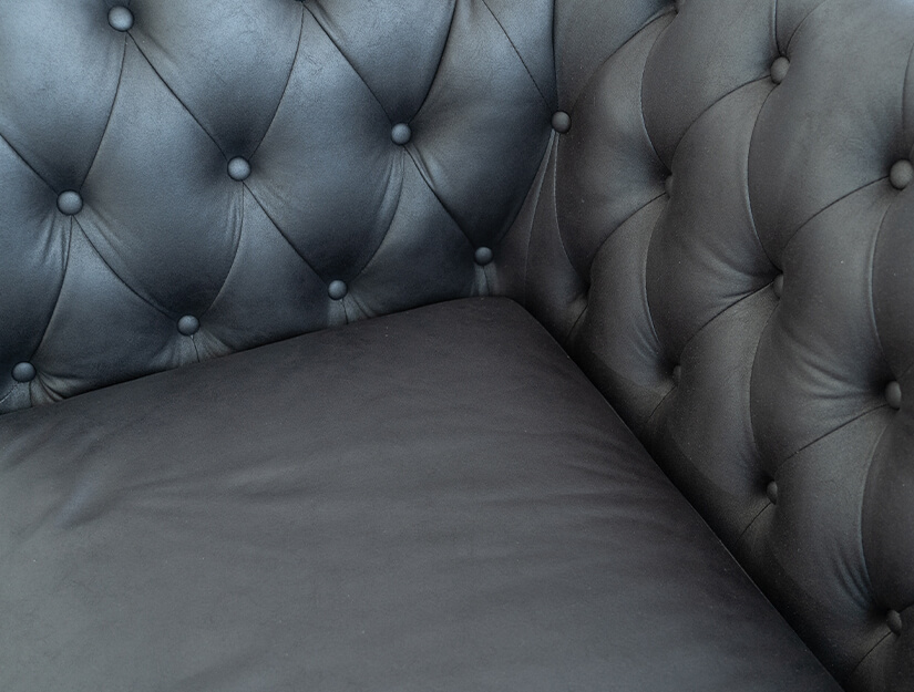 Upholstered in high tech fabric. Easy to clean & maintain. Texture & grain akin to genuine leather.