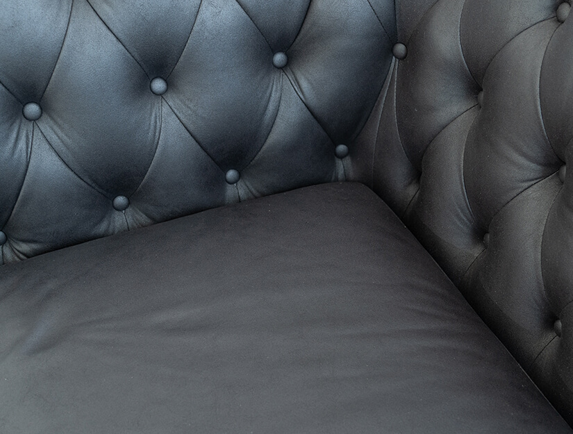 Upholstered in high tech fabric. Easy to clean & maintain. Texture & grain akin to genuine leather