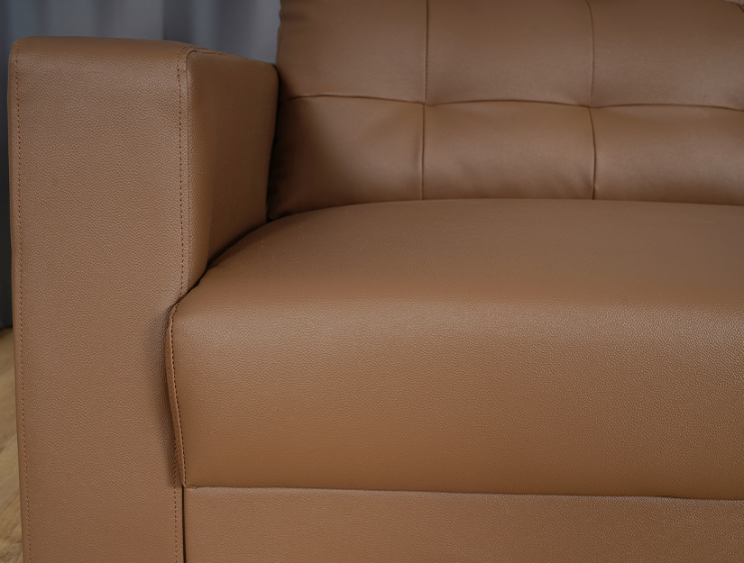 Upholstered in vegan PVC leather. Stunning leather finish & grain. 