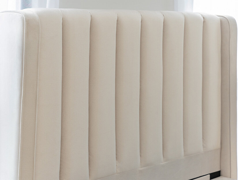 Ultra-tall headboard. Thick & padded for extra comfort. Vertical channel tufting. Elegant & opulent.